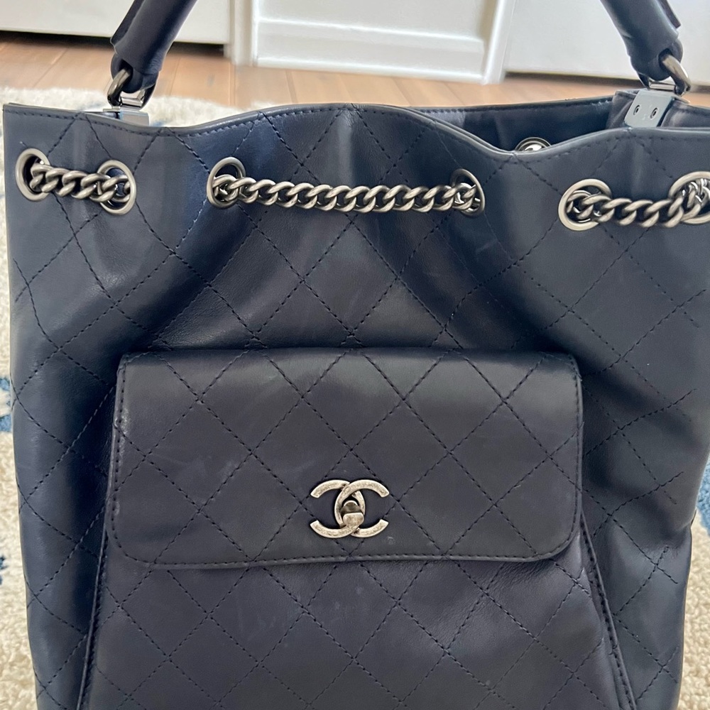 CHANEL Calfskin Large Urban Backapck 
Rare, barely worn, dust bag and box.